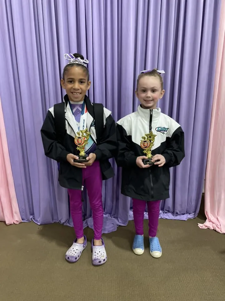 Galaxy Gymnastics gymnast competing on balance beam